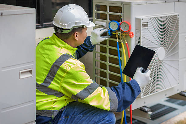 Professional Hvac technician working in Decaturville, TN